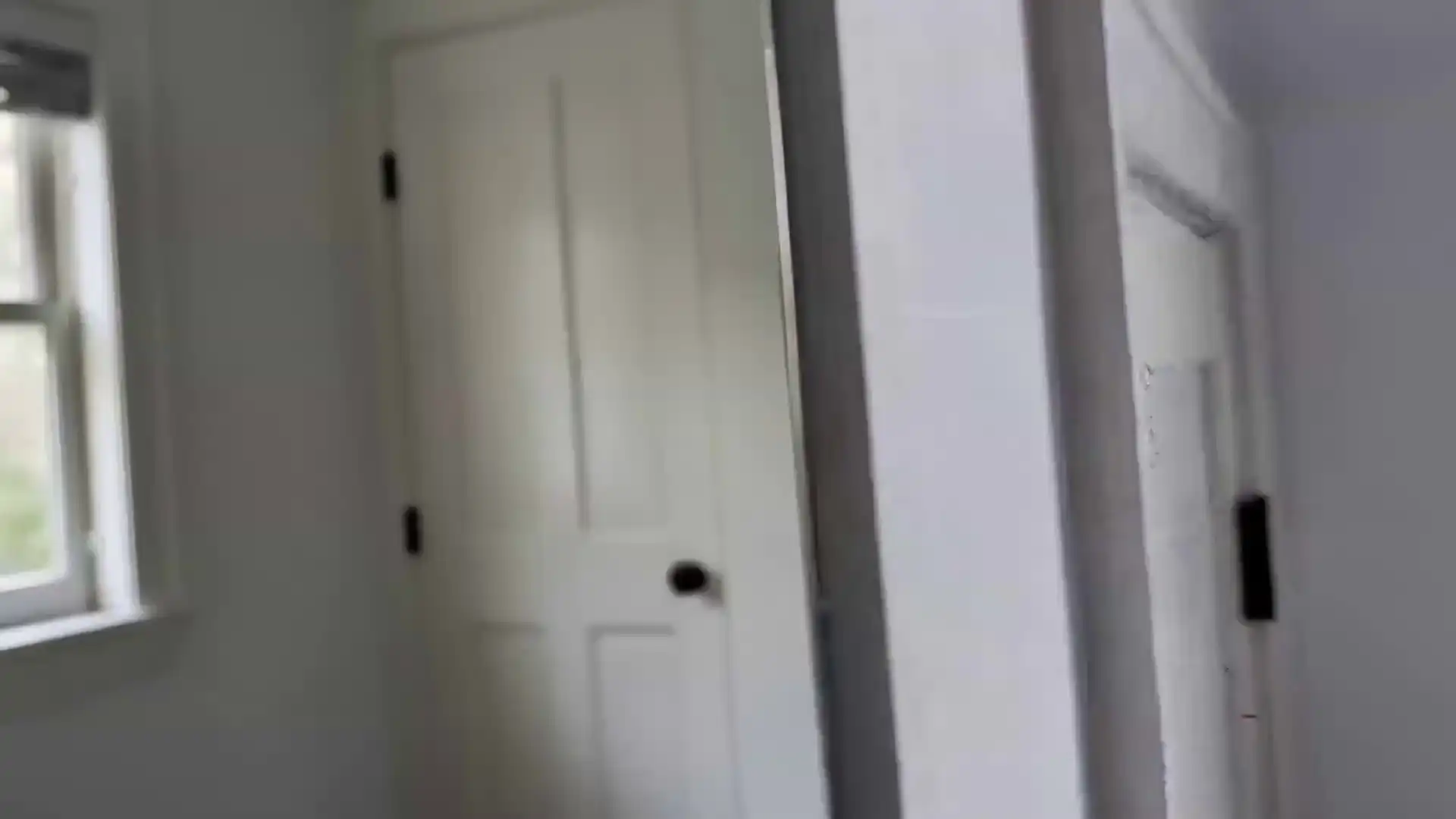 A person touches a mirror that ripples like liquid — video remix transformation using the Gemini Omni Flash Video Generator