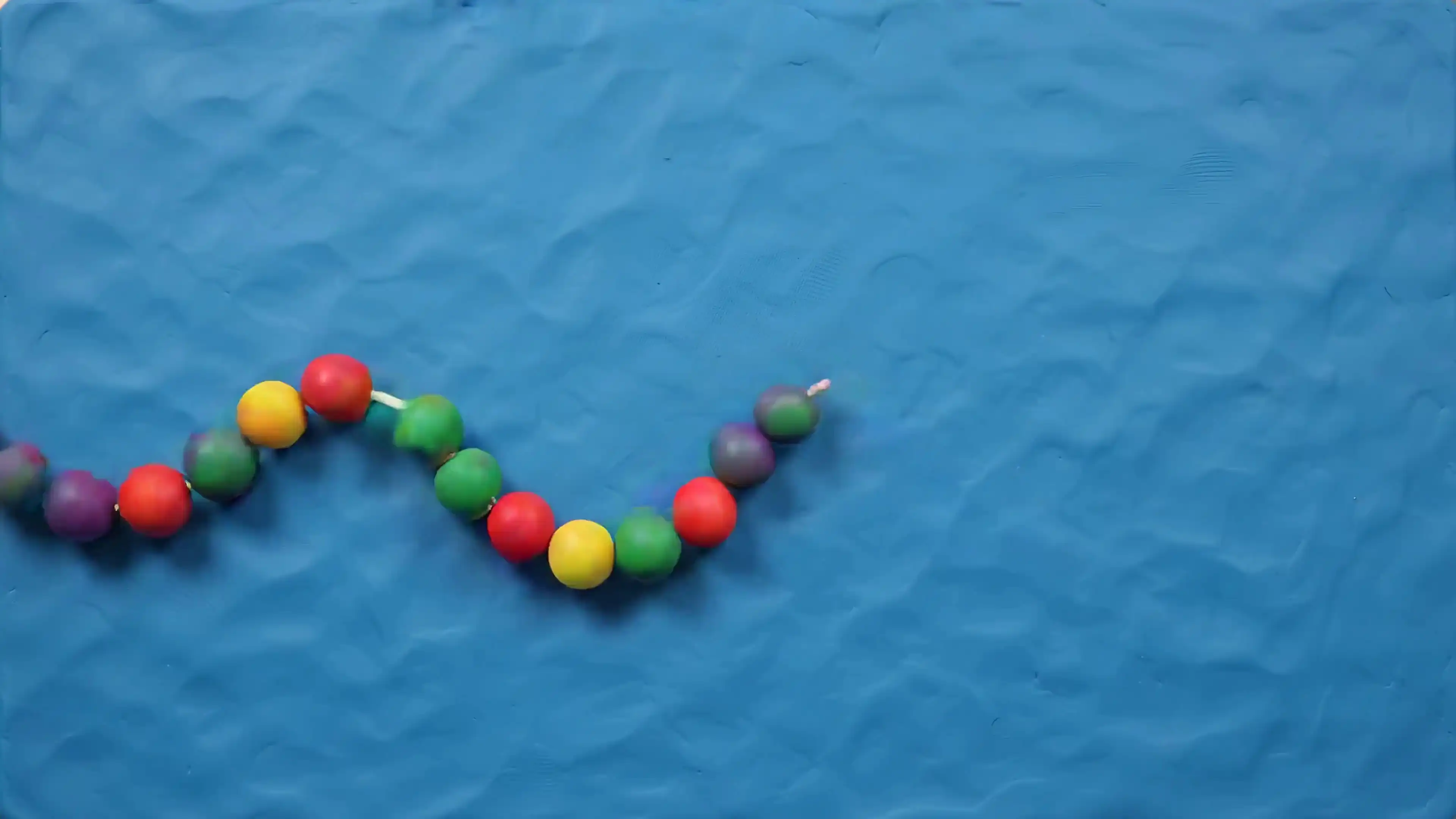 Scientifically accurate claymation stop-motion explainer of protein folding, produced by Gemini Omni Flash