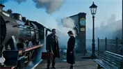 Gemini Omni - A cinematic misty dawn train station with a man in a trench coat and a vintage steam train.